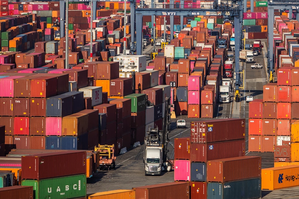 Shipping containers and trucks at the Port of Los Angeles in San Pedro, California.