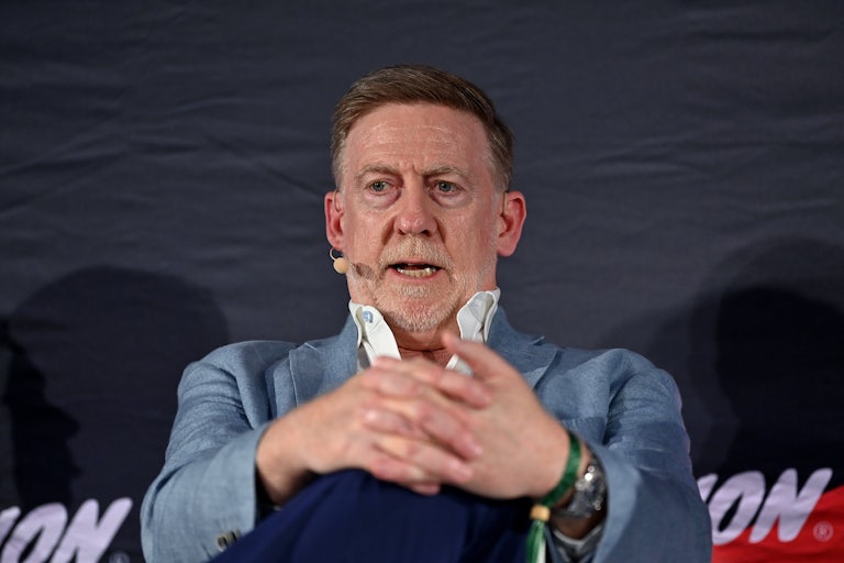 60 Minutes executive producer Bill Owens speaks while sitting with his hands folded around his knee