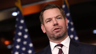Eric Swalwell speaks at a press conference.