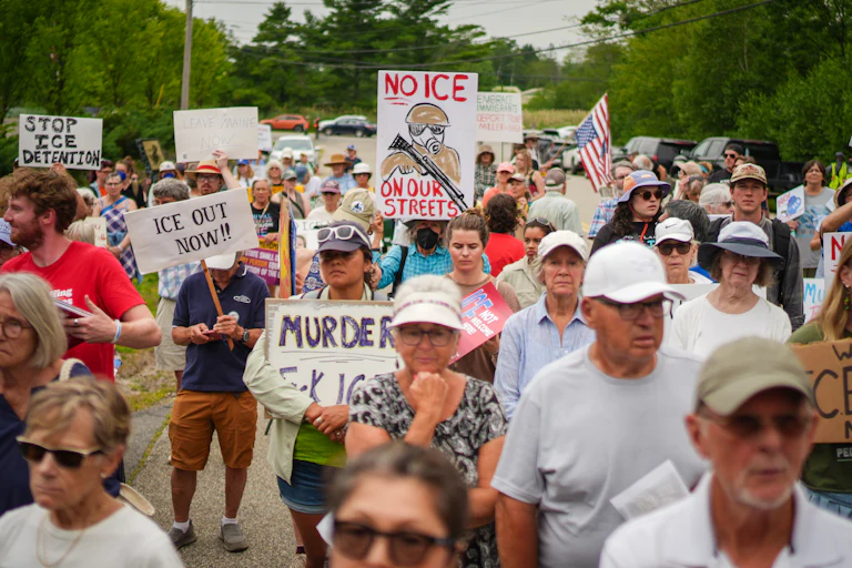 People protest outside of a federal immigration office in Scarborough, Maine, on July 14, after Joan Sebastian Guerrero was fatally shot by ICE agents.