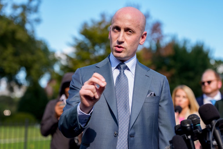 Stephen Miller speaks to reporters outside the White House.