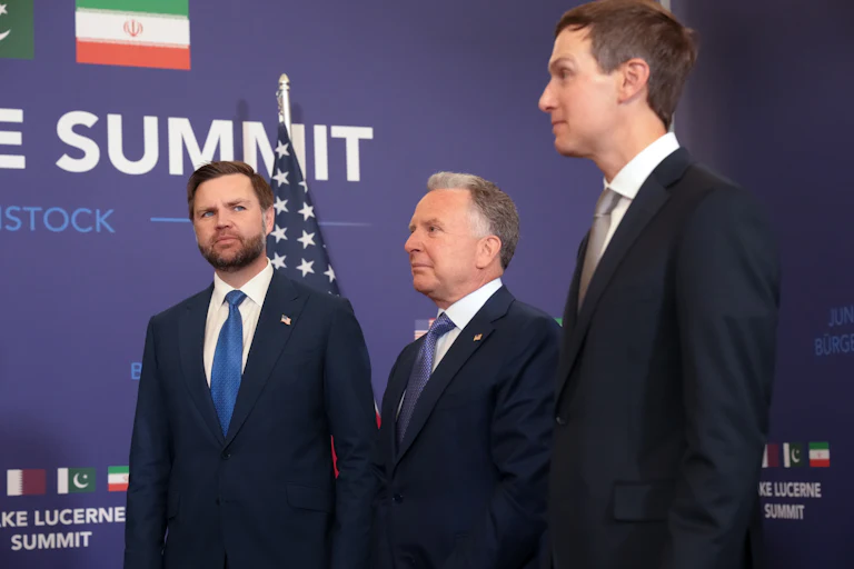 JD Vance looks over at Jard Kushner, with Steve Witkoff standing between them.