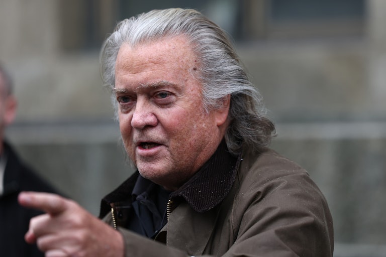 Steve Bannon speaks to members of the media as he leaves the courtroom