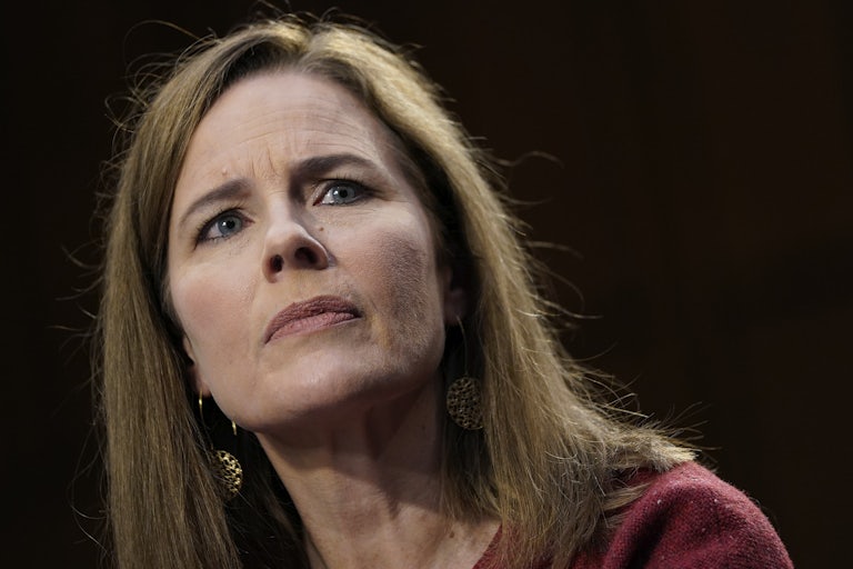 Supreme Court Justice Amy Coney Barrett looks grim