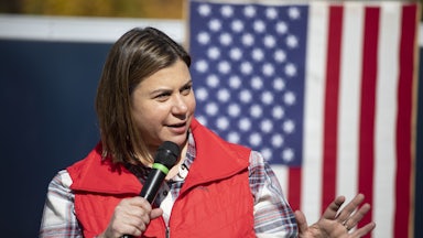 Elisa Slotkin speaks into a microphone at a campaign event
