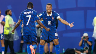 Kylian Mbappé and Ousmane Dembélé celebrate a goal against Iraq at the 2026 World Cup.