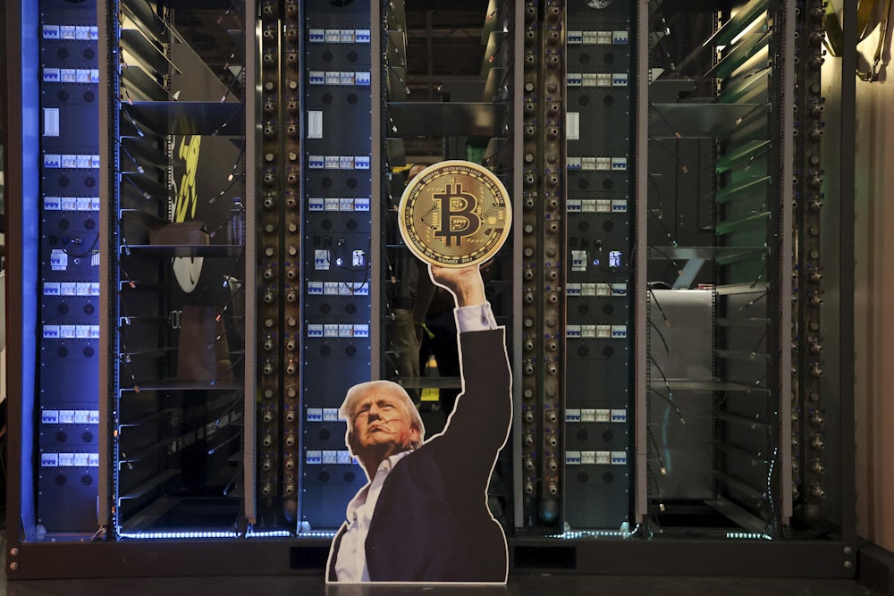 A cutout of US President Donald Trump holding a Bitcoin is displayed on a group of servers during The Bitcoin Conference at The Venetian Las Vegas in Las Vegas, Nevada.