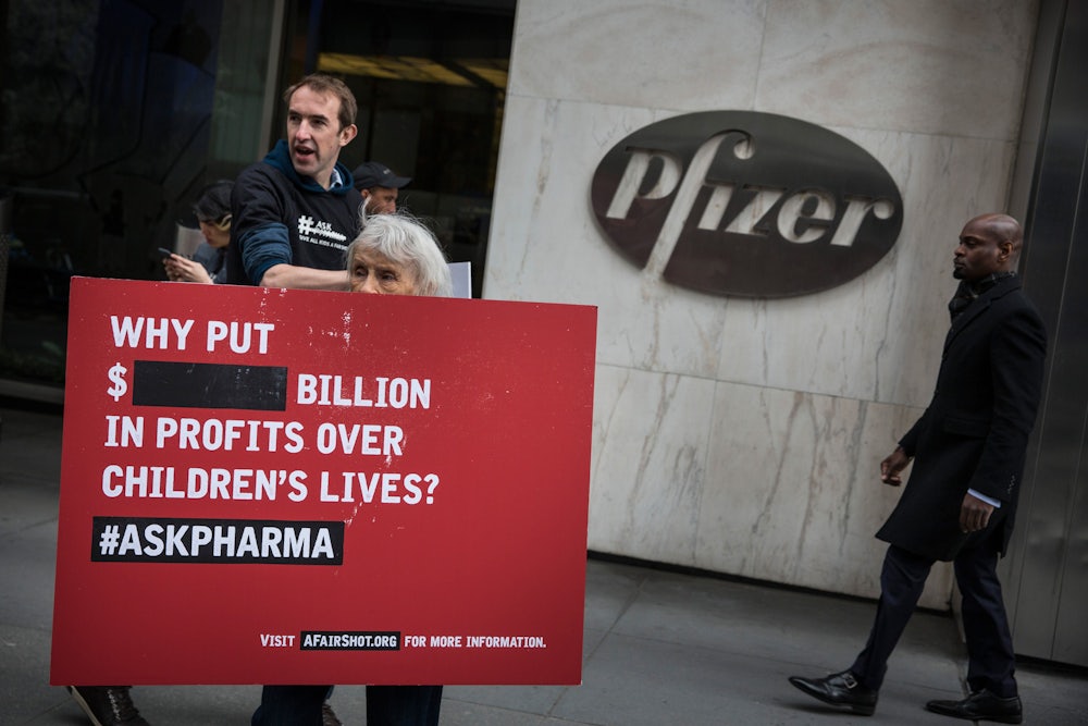 Protesters picket outside Pfizer's Manhattan office, demanding equitable global access to vaccines.