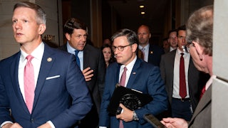 House Speaker Mike Johnson, center, spoke with Representative Jodey Arrington, center left, at the U.S. Capitol on May 15.