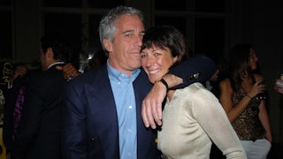 Jeffrey Epstein puts his arm around Ghislaine Maxwell's shoulder and his mouth near her forehead.