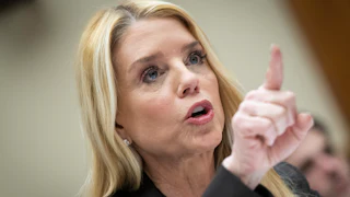 Ex-Attorney General Pam Bondi points while speaking during a House committee hearing