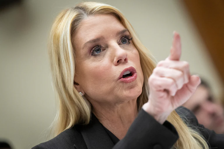 Ex-Attorney General Pam Bondi points while speaking during a House committee hearing