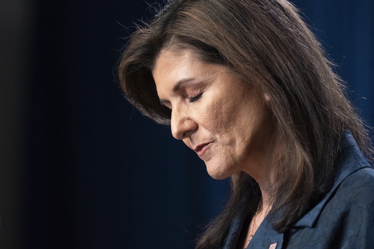 Nikki Haley closing her eyes and looking down