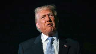 Donald Trump grimaces while talking