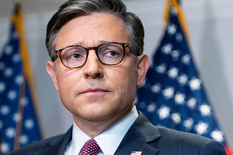 Mike Johnson looks to the side