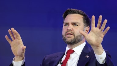 Vice President JD Vance gestures and speaks