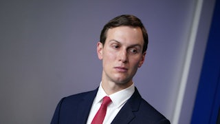 A close-up of Jared Kushner as he casts a glance to the left.