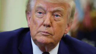 Donald Trump stares blankly and listlessly