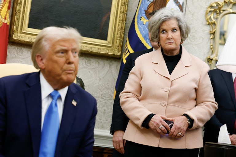 White House Chief of Staff Susie Wiles looks at Donald Trump during his press conference with Israeli Prime Minister Benjamin Netanyahu