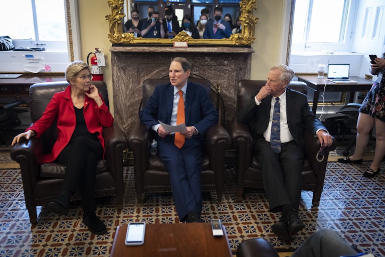 Senators Elizabeth Warren, Ron Wyden, and Angus King speak to reporters about a corporate minimum tax plan