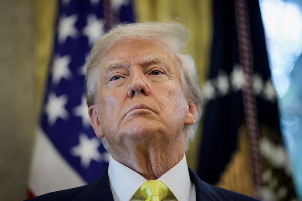 Donald Trump takes a question in the Oval Office.