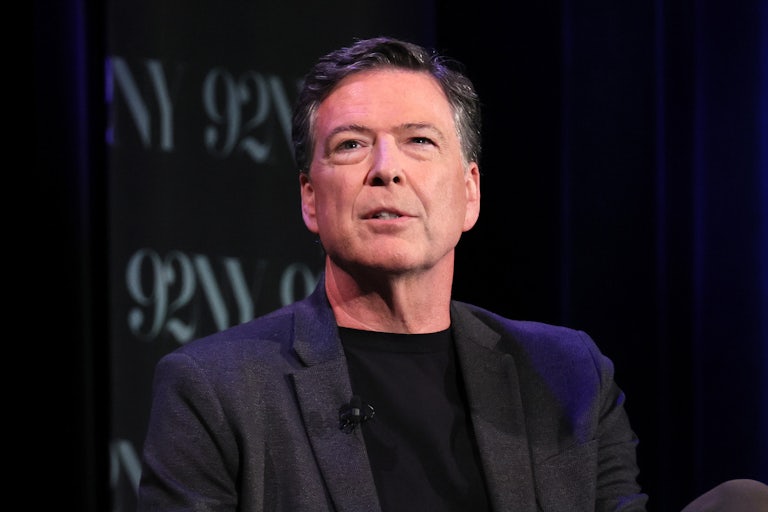Fromer FBI chief James Comey speaks on a panel.