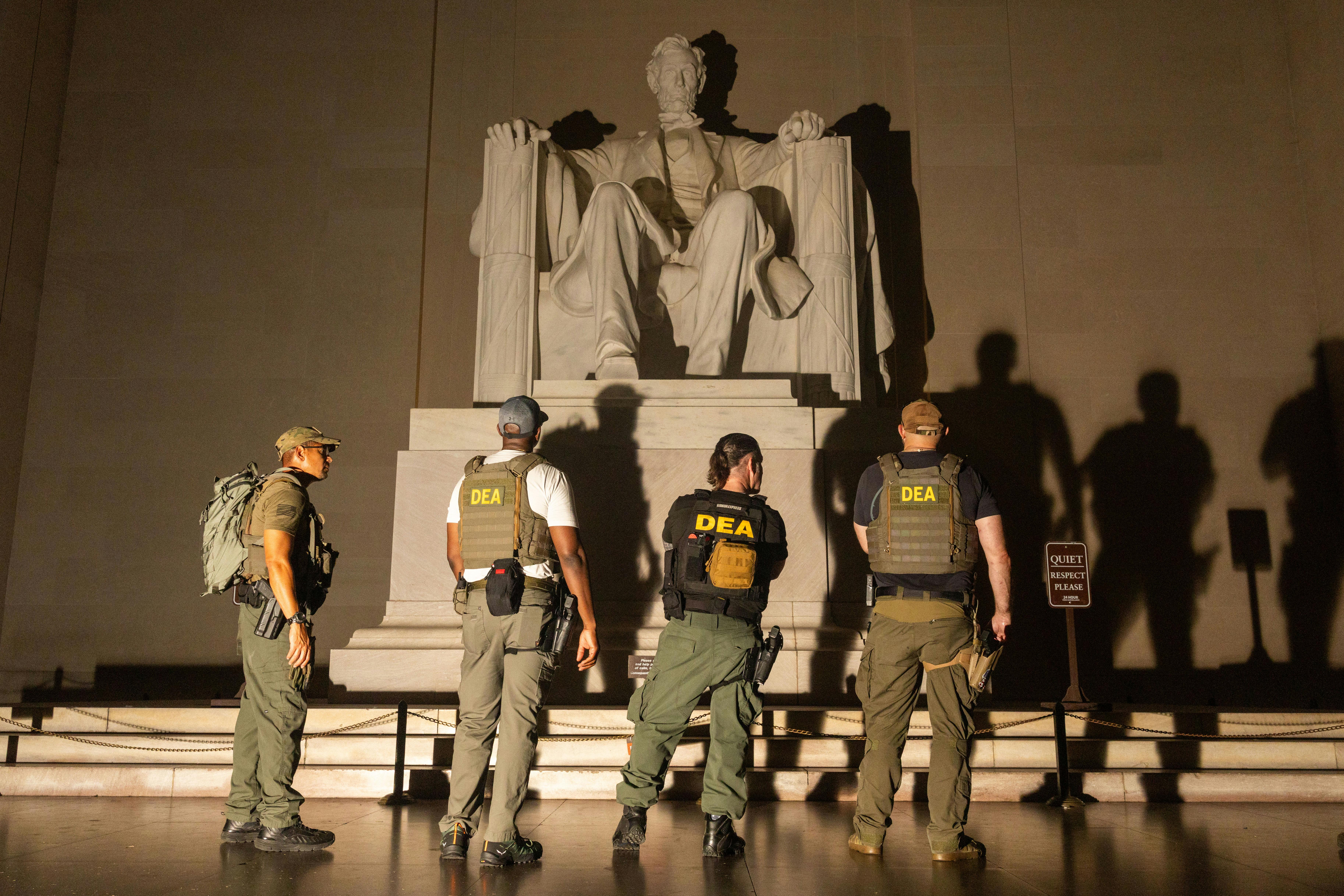 Members of the Drug Enforcement Agency and Police patrol the Lincoln Memorial, for some reason.