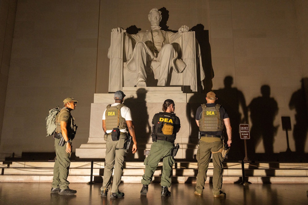 Members of the Drug Enforcement Agency and Police patrol the Lincoln Memorial, for some reason.