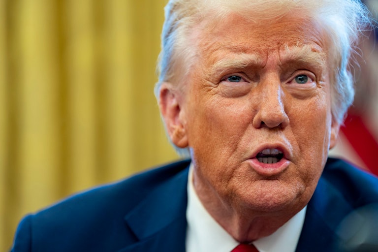 Donald Trump speaks to reporters in the Oval Office