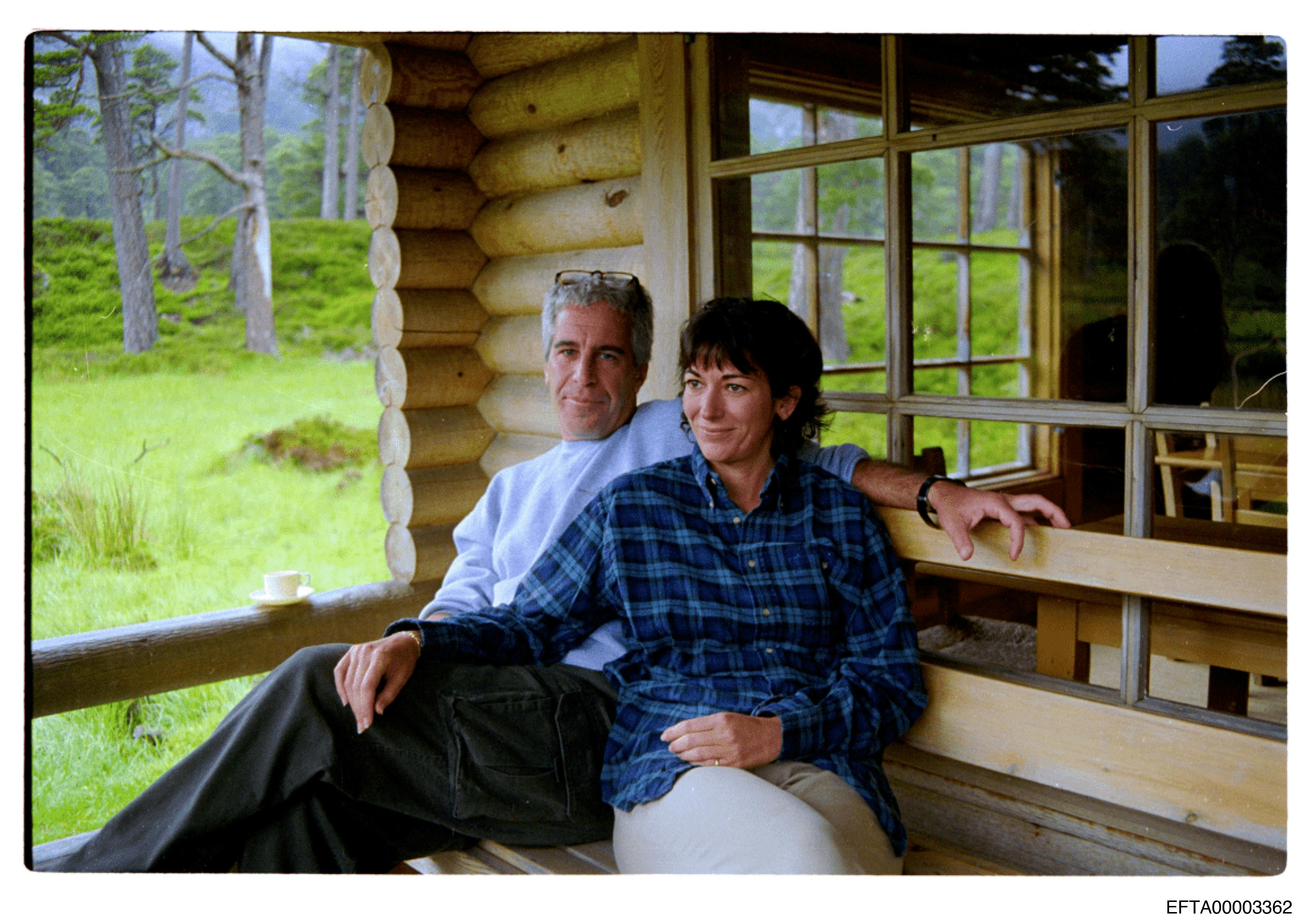 Jeffrey Epstein and Ghislaine Maxwell sit close together on a bench