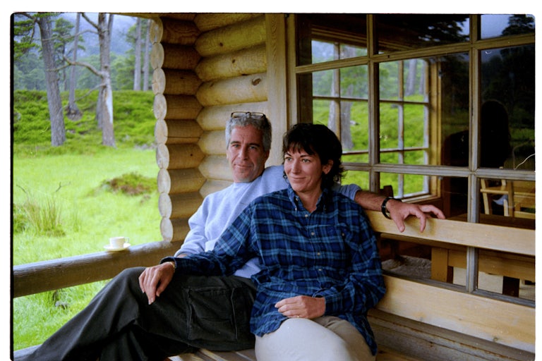 Jeffrey Epstein and Ghislaine Maxwell sit close together on a bench
