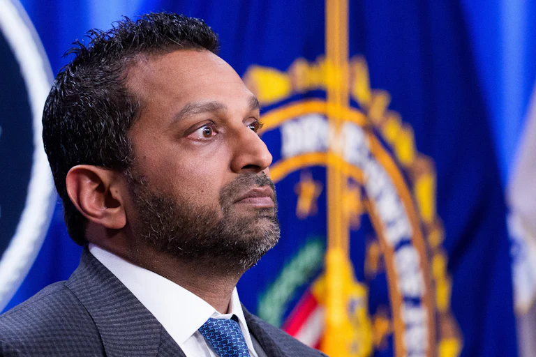FBI Director Kash Patel stands during a press conference