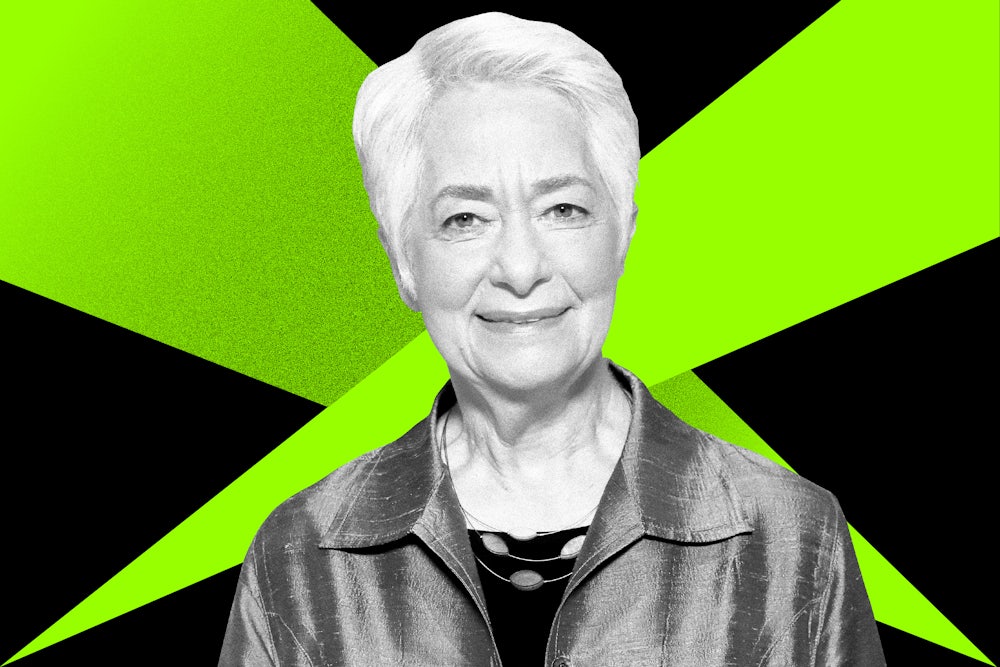 Heather Booth in front of a black and green background