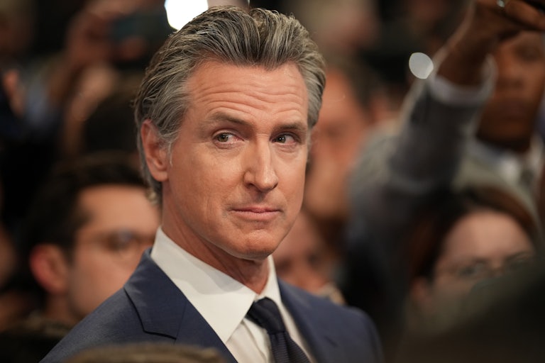 Gavin Newsom looks smugly ahead