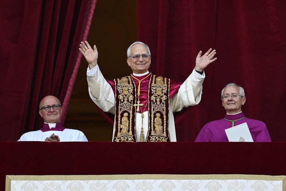 Newly elected Pope Leo XIV, Robert Prevost addresses the crowd on the main central loggia balcony overlooking St Peter's Square on May 08, 2025.