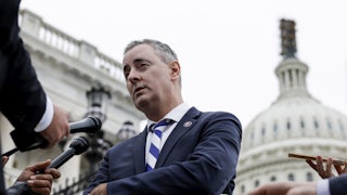 Representative Brian Fitzpatrick speaks to reporters outside the Capitol.