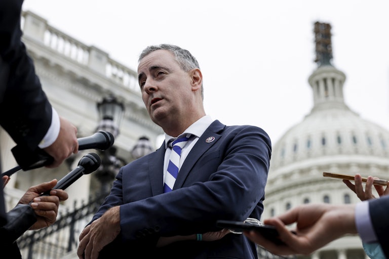 Representative Brian Fitzpatrick speaks to reporters outside the Capitol.