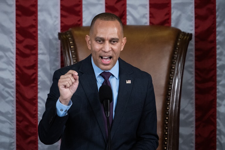 Hakeem Jeffries gestures while speaking in Congress