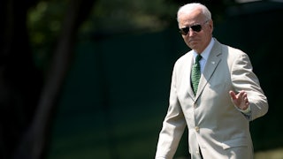 President Joe Biden waves as he departs the White House.