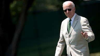 President Joe Biden waves as he departs the White House.