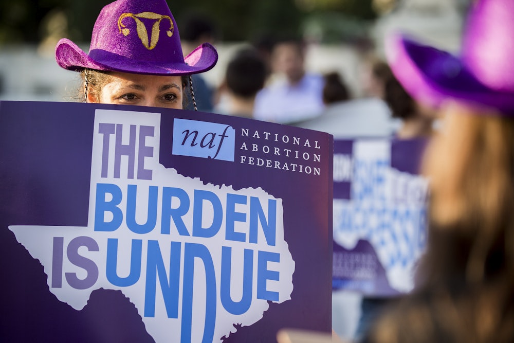 woman protests Texas abortion restrictions