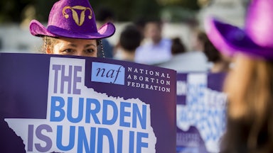 woman protests Texas abortion restrictions