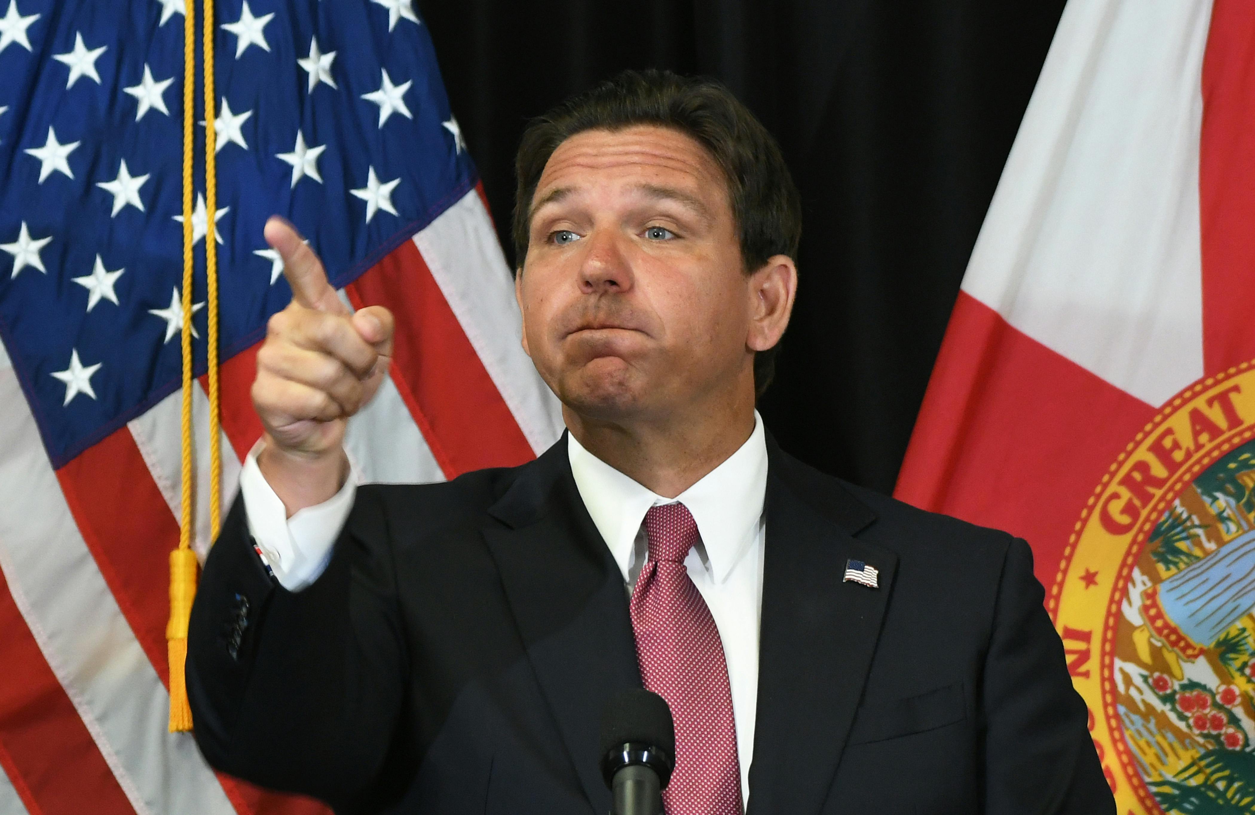 Ron DeSantis points a finger.