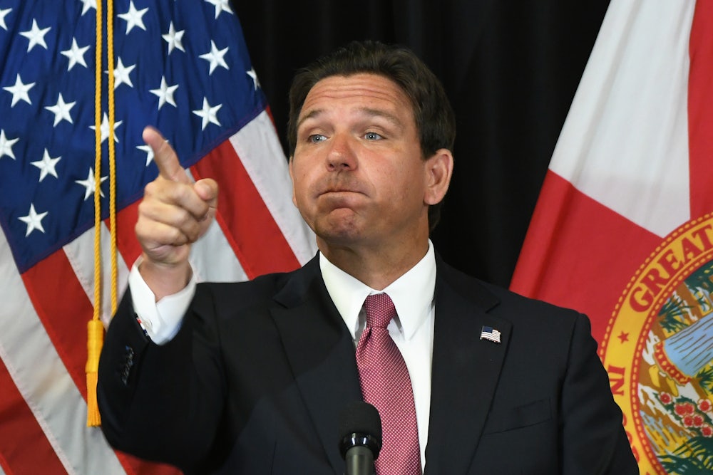 Ron DeSantis points a finger.