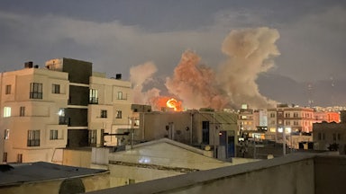 Plumes of smoke rise following reported explosions near Iran’s Ministry of Intelligence on Araqi Street in Tehran.