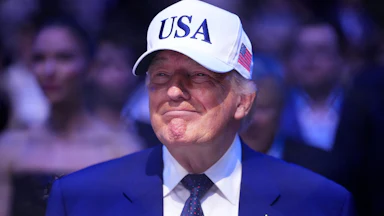 Donald Trump wearing a USA hat