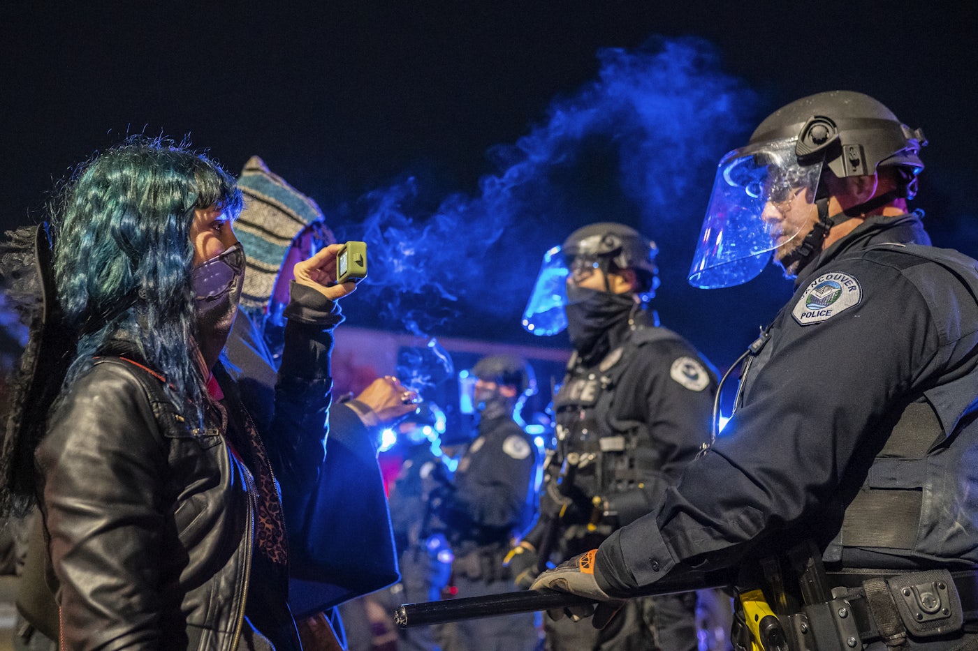 A Black Lives Matter protester films the police at an encounter in Washington state.
