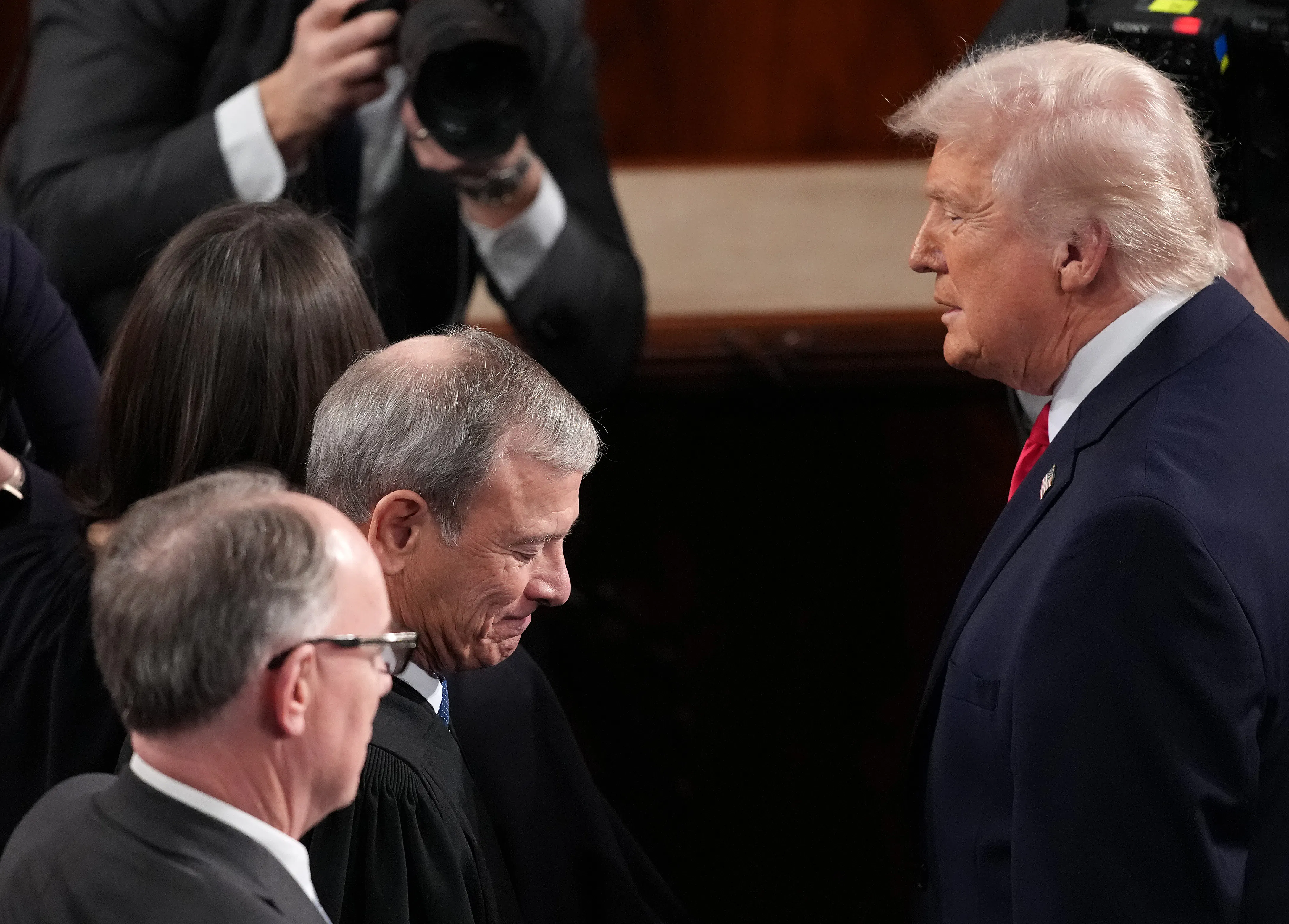 On February 24, 2026, President Donald Trump greeted Justice John Roberts at Trump’s State of the Union address in Washington, D.C. 