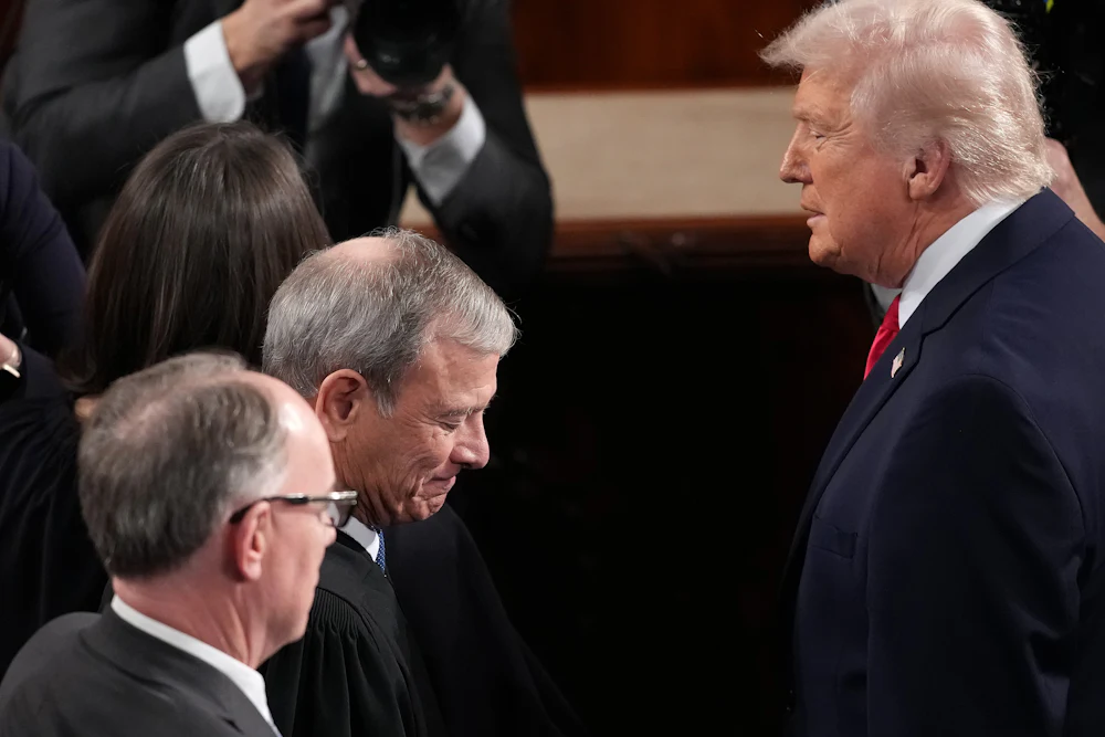 On February 24, 2026, President Donald Trump greeted Justice John Roberts at Trump’s State of the Union address in Washington, D.C.