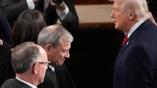 On February 24, 2026, President Donald Trump greeted Justice John Roberts at Trump’s State of the Union address in Washington, D.C.